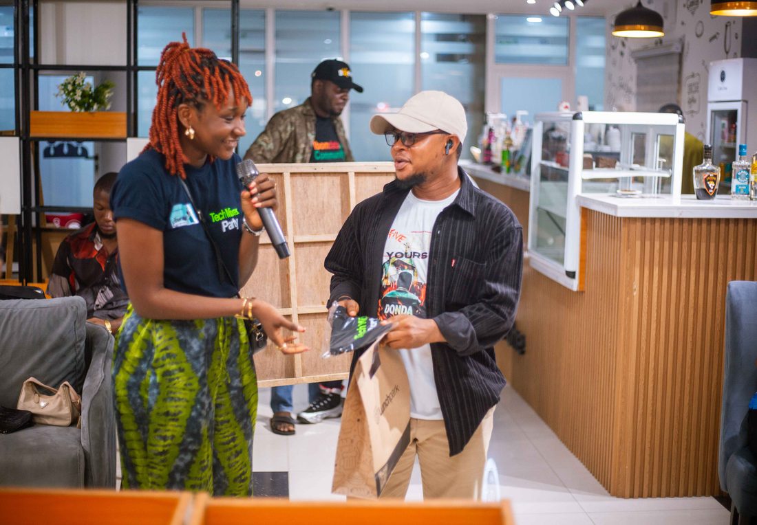Community members networking and talking together at a Tech Mixer event